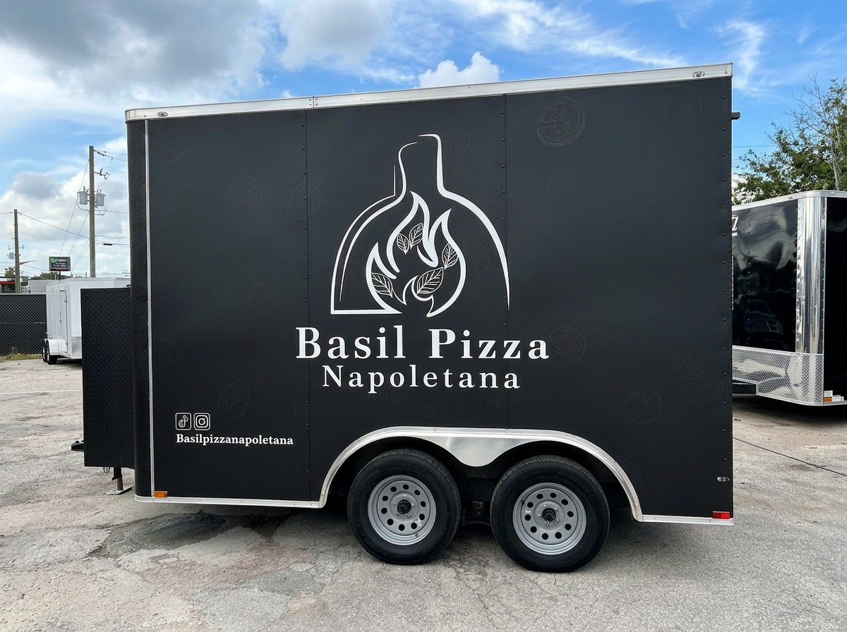 Black pizza trailer branding wrap